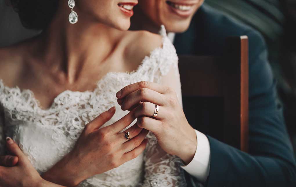 lovely bridal couple embracing, happy wedding, bride and groom together